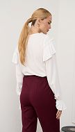 Фото belaa-bluza-s-rusami-017 товару Біла блуза з рюшами0