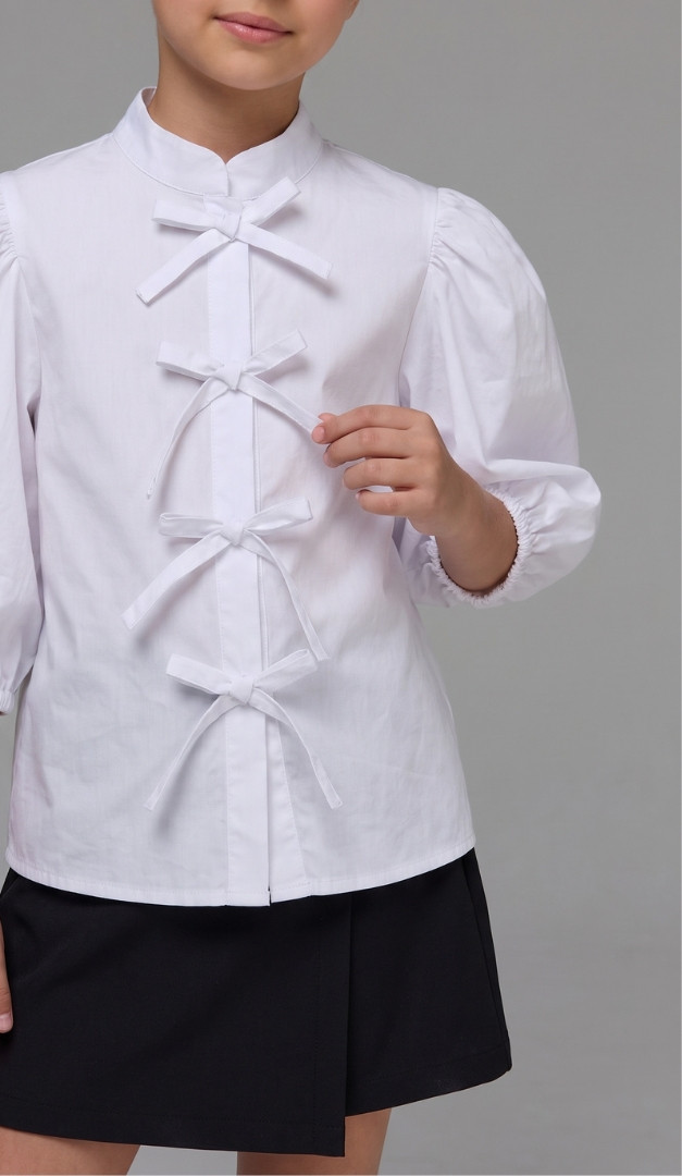 Фото bluza-dla-devocki-zavazki-bantiki-belaa-06 товара Блуза для девочки завязки бантики белая0